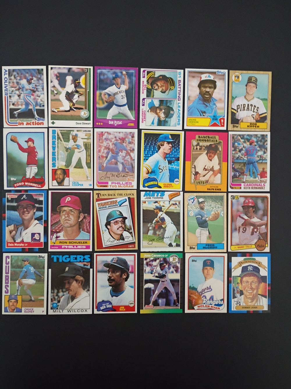 24 - 1970s 80s Baseball cards Nolan Ryan Andre Dawson Torre Rice McGraw Canseco